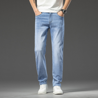 Trendy cotton casual straight leg jeans for men, 2026 new summer style, fashionable and versatile, loose fit, light color.